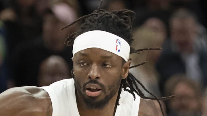 Portland Trail Blazers forward Jerami Grant dribbles the ball against the Minnesota Timberwolves.