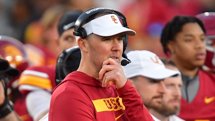 Nov 16, 2024; Los Angeles, California, USA; Southern California Trojans head coach Lincoln Riley watches game action against the Nebraska Cornhuskers during the second half at the Los Angeles Memorial Coliseum. Mandatory Credit: Gary A. Vasquez-Imagn Images