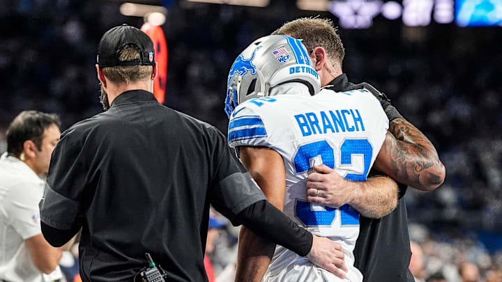 Detroit Lions safety Brian Branch (32) with help of Lions staff, walk off the field due to an injury during the second half Detroit Lions safety Brian Branch (32) with help of Lions staff, walk off the field due to an injury during the second half