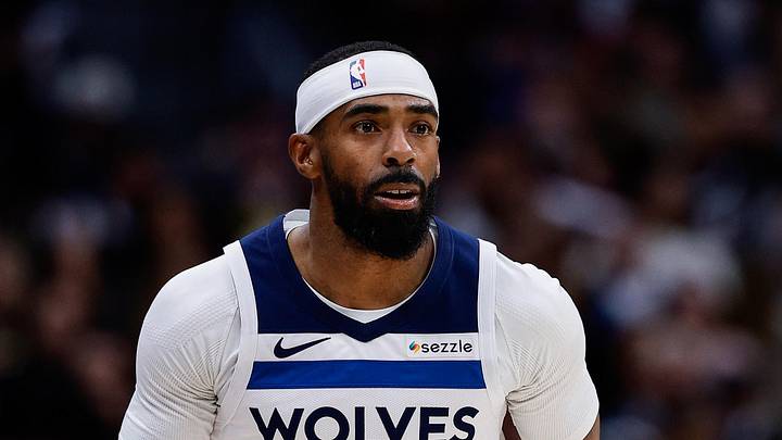 Apr 27, 2026; Denver, Colorado, USA; Minnesota Timberwolves guard Mike Conley (10) dribbles the ball up court in the first quarter against the Denver Nuggets during game five of the first round of the 2026 NBA Playoffs at Ball Arena. Mandatory Credit: Isaiah J. Downing-Imagn Images