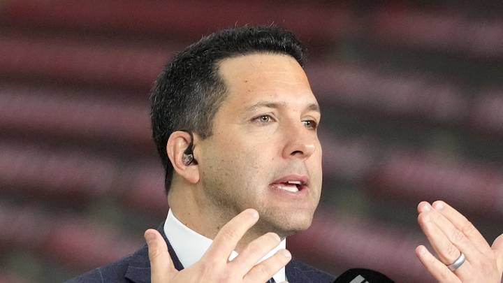 Adam Schefter talks on a set Adam Schefter talks on a set