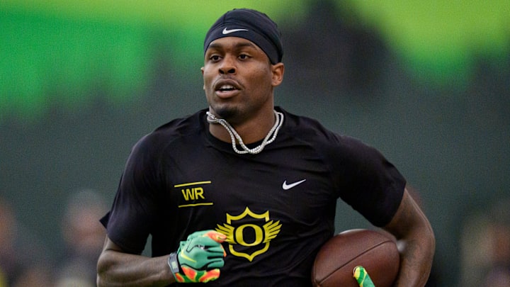 Oregon wide receiver Malik Benson carries the ball during Oregon Pro Day on March 17, 2026, at the Moshofsky Center in Eugene, Oregon. Oregon wide receiver Malik Benson carries the ball during Oregon Pro Day on March 17, 2026, at the Moshofsky Center in Eugene, Oregon.