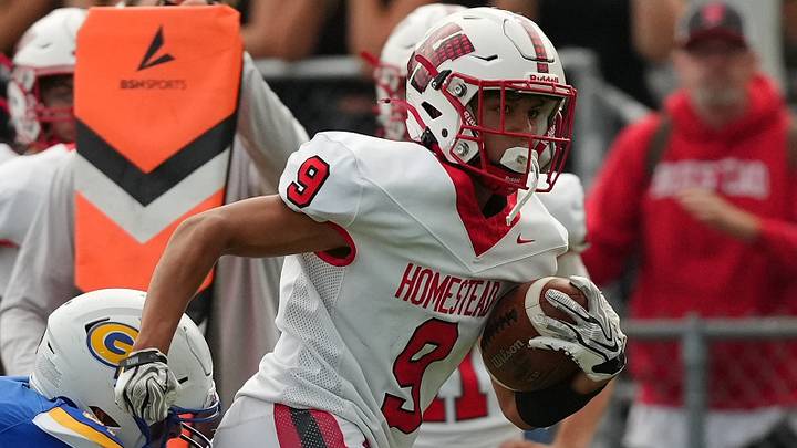 Homestead running back Vincent Yodbut (9) sprints down the sideline versus Germantown in a non-conference game on August 21, 2026. Homestead running back Vincent Yodbut (9) sprints down the sideline versus Germantown in a non-conference game on August 21, 2026.
