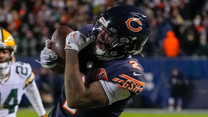 Jan 10, 2026; Chicago, IL, USA; Chicago Bears wide receiver DJ Moore (2) makes the eventual game winning touchdown catch against the Green Bay Packers during the second half of an NFC Wild Card Round game at Soldier Field. Mandatory Credit: David Banks-Imagn Images Jan 10, 2026; Chicago, IL, USA; Chicago Bears wide receiver DJ Moore (2) makes the eventual game winning touchdown catch against the Green Bay Packers during the second half of an NFC Wild Card Round game at Soldier Field. Mandatory Credit: David Banks-Imagn Images
