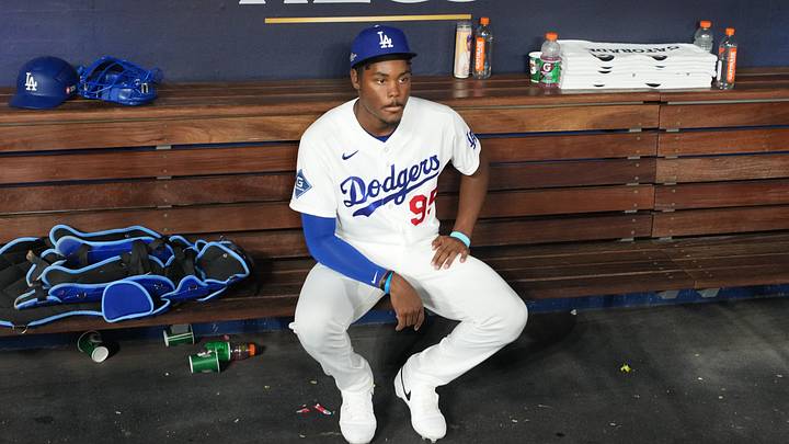 Los Angeles Dodgers designated hitter Josue De Paula (95) sits in the duguout after losing in game four of the NLCS for the 2026 MLB Playoffs against the Milwaukee Brewers at Uniqlo Field at Dodger Stadium on Oct. 15, 2026. Los Angeles Dodgers designated hitter Josue De Paula (95) sits in the duguout after losing in game four of the NLCS for the 2026 MLB Playoffs against the Milwaukee Brewers at Uniqlo Field at Dodger Stadium on Oct. 15, 2026.