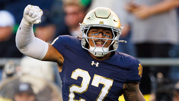 Notre Dame linebacker Kyngstonn Viliamu-Asa (27) celebrates an interception against NC State at Notre Dame Stadium. Notre Dame linebacker Kyngstonn Viliamu-Asa (27) celebrates an interception against NC State at Notre Dame Stadium.