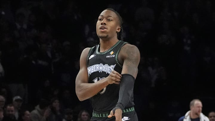 Feb 8, 2026; Minneapolis, Minnesota, USA; Minnesota Timberwolves guard Ayo Dosunmu (13) enters the game for the first time as a member of the team and receives a standing ovation as he readies to play the Los Angeles Clippers in the first quarter at Target Center. Mandatory Credit: Bruce Kluckhohn-Imagn Images