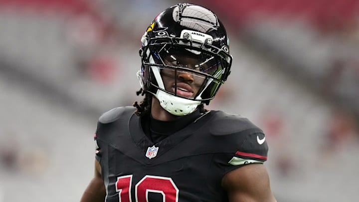 Arizona Cardinals receiver Marvin Harrison Jr. (18) warms up before their game against the Tennessee Titans at State Farm Stadium in Glendale on Oct. 5, 2025.