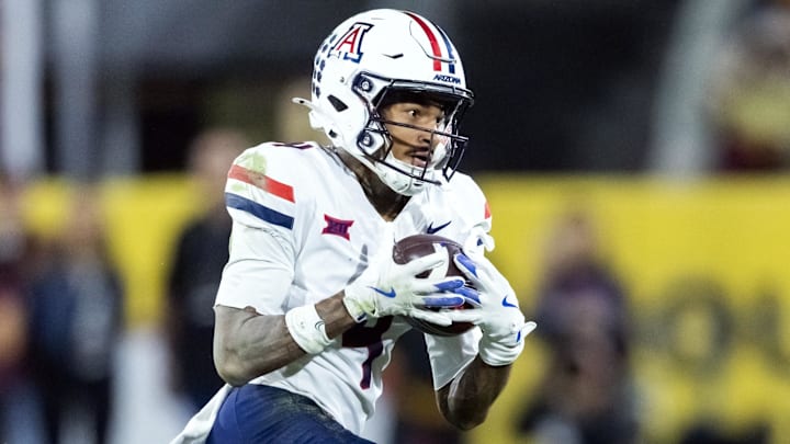 Nov 28, 2025; Tempe, Arizona, USA; Arizona Wildcats wide receiver Kris Hutson (4) against the Arizona State Sun Devils during the 99th Territorial Cup at Mountain America Stadium. Mandatory Credit: Mark J. Rebilas-Imagn Images Nov 28, 2025; Tempe, Arizona, USA; Arizona Wildcats wide receiver Kris Hutson (4) against the Arizona State Sun Devils during the 99th Territorial Cup at Mountain America Stadium. Mandatory Credit: Mark J. Rebilas-Imagn Images