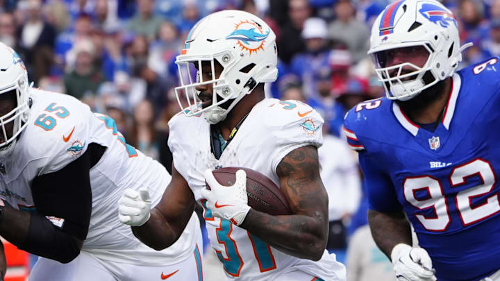 Nov 3, 2024; Orchard Park, New York, USA; Miami Dolphins running back Raheem Mostert (31) runs with the ball against the Buffalo Bills during the second half at Highmark Stadium. Mandatory Credit: Gregory Fisher-Imagn Images Nov 3, 2024; Orchard Park, New York, USA; Miami Dolphins running back Raheem Mostert (31) runs with the ball against the Buffalo Bills during the second half at Highmark Stadium. Mandatory Credit: Gregory Fisher-Imagn Images