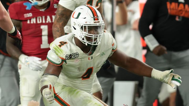 Jan 19, 2026; Miami Gardens, FL, USA; Miami Hurricanes defensive lineman Rueben Bain Jr. (4) celebrates after a sack of Indiana Hoosiers quarterback Fernando Mendoza (15) in the third quarter during the College Football Playoff National Championship game at Hard Rock Stadium. Mandatory Credit: Sam Navarro-Imagn Images
