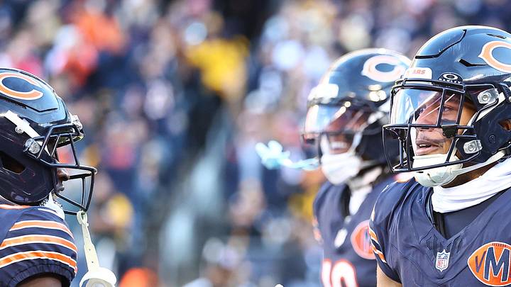 Nov 23, 2025; Chicago, Illinois, USA; Chicago Bears wide receiver DJ Moore (2) reacts after making a touchdown catch against the Pittsburgh Steelers during the second half at Soldier Field. Mandatory Credit: Mike Dinovo-Imagn Images