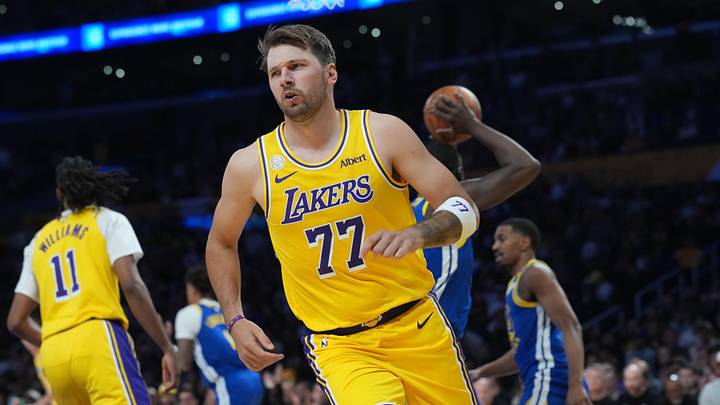 Oct 21, 2026; Los Angeles, California, USA; Los Angeles Lakers guard Luka Doncic (77) reacts after scoring against the Golden State Warriors in the first half at Crypto.com Arena. Mandatory Credit: Kirby Lee-Imagn Images