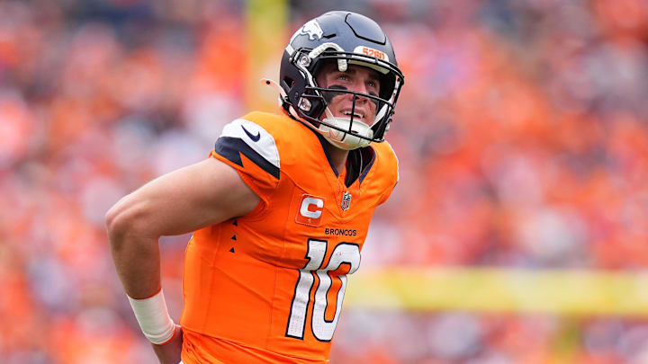 Oct 27, 2024; Denver, Colorado, USA; Denver Broncos quarterback Bo Nix (10) during the first half against the Carolina Panthers at Empower Field at Mile High. 