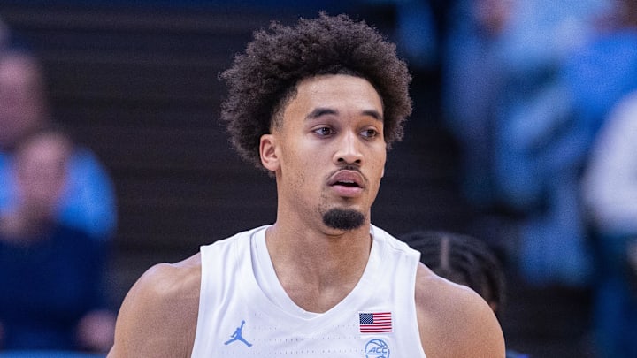 Dec 22, 2025; Chapel Hill, North Carolina, USA; North Carolina Tar Heels guard Seth Trimble (7) brings the ball up court against the East Carolina Pirates during the second half at Dean E. Smith Center. Mandatory Credit: Scott Kinser-Imagn Images Dec 22, 2025; Chapel Hill, North Carolina, USA; North Carolina Tar Heels guard Seth Trimble (7) brings the ball up court against the East Carolina Pirates during the second half at Dean E. Smith Center. Mandatory Credit: Scott Kinser-Imagn Images