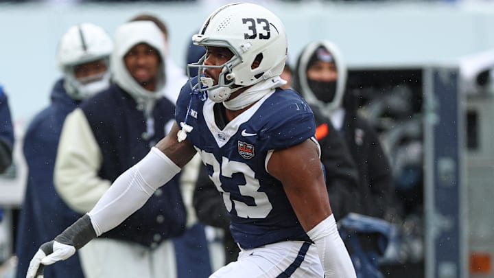 Penn State Nittany Lions defensive end Dani Dennis-Sutton (33) celebrates after a sack during the first half