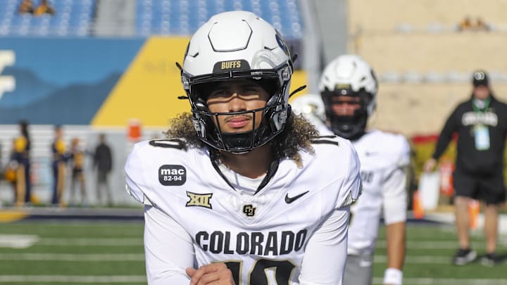 Nov 8, 2025; Morgantown, West Virginia, USA; Colorado Buffaloes quarterback Julian Lewis (10) warms up prior to their game against the West Virginia Mountaineers at Milan Puskar Stadium. Mandatory Credit: Ben Queen-Imagn Images
