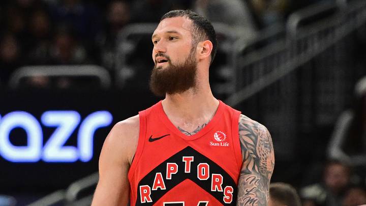 Feb 22, 2026; Milwaukee, Wisconsin, USA; Toronto Raptors forward Sandro Mamukelashvili (54) reacts after scoring a basket in the fourth quarter against the Milwaukee Bucks at Fiserv Forum. Mandatory Credit: Benny Sieu-Imagn Images