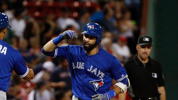 Sep 27, 2017; Boston, MA, USA; Toronto Blue Jays right fielder Jose Bautista (19) is congratulated by third base coach Luis Rivera (4) as he rounds the bases after his two run home run against the Boston Red Sox during the first inning at Fenway Park. Mandatory Credit: Winslow Townson-USA TODAY Sports