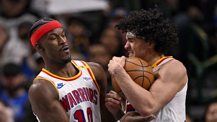 Feb 12, 2025; Dallas, Texas, USA; Golden State Warriors forward Jimmy Butler (10) and forward Gui Santos (15) in action during the game between the Dallas Mavericks and the Golden State Warriors at the American Airlines Center. Mandatory Credit: Jerome Miron-Imagn Images