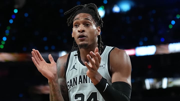 Dec 13, 2025; Las Vegas, Nevada, USA; San Antonio Spurs guard Devin Vassell (24) reacts during the second quarter against the Oklahoma City Thunder at T-Mobile Arena. Mandatory Credit: Kirby Lee-Imagn Images