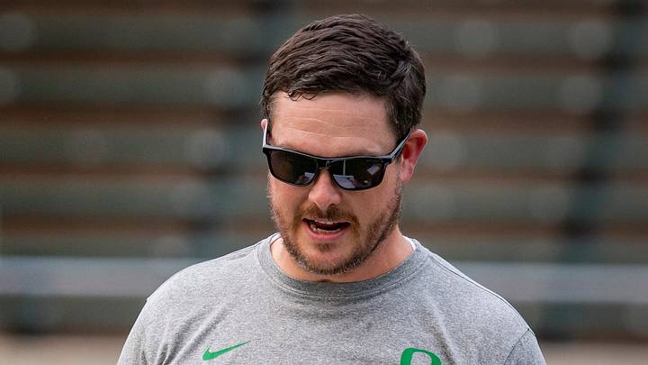 Oregon head coach Dan Lanning walks the field during a Saturday Night Live event to host youth football players at Autzen Stadium Saturday, July 30, 2022. Oregon head coach Dan Lanning walks the field during a Saturday Night Live event to host youth football players at Autzen Stadium Saturday, July 30, 2022.