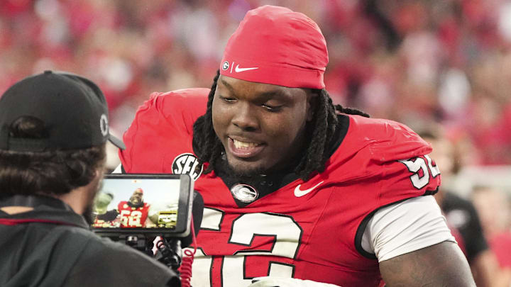 Oct 18, 2025; Athens, Georgia, USA; Georgia Bulldogs defensive lineman Christen Miller (52) is interviewed after the game against the Mississippi Rebels at Sanford Stadium. Oct 18, 2025; Athens, Georgia, USA; Georgia Bulldogs defensive lineman Christen Miller (52) is interviewed after the game against the Mississippi Rebels at Sanford Stadium.