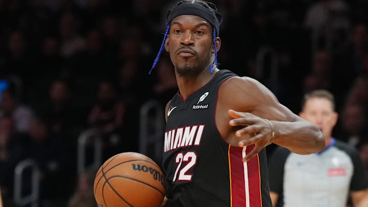 Dec 4, 2024; Miami, Florida, USA; Miami Heat forward Jimmy Butler (22) dribbles against the Los Angeles Lakers in during the first half at Kaseya Center. Mandatory Credit: Jim Rassol-Imagn Images Dec 4, 2024; Miami, Florida, USA; Miami Heat forward Jimmy Butler (22) dribbles against the Los Angeles Lakers in during the first half at Kaseya Center. Mandatory Credit: Jim Rassol-Imagn Images