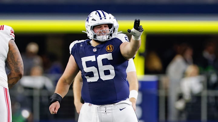 Dallas Cowboys center Cooper Beebe signals at the line against the New York Giants during the second quarter at AT&T Stadium. 