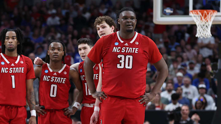 Mar 31, 2024; Dallas, TX, USA; North Carolina State Wolfpack guard Jayden Taylor (1) and guard DJ