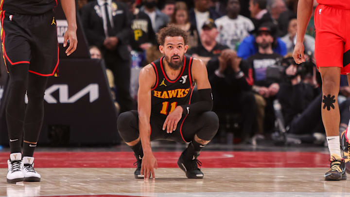 Jan 23, 2025; Atlanta, Georgia, USA; Atlanta Hawks guard Trae Young (11) reacts after a miss against the Toronto Raptors