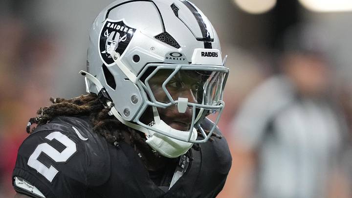 Jan 4, 2026; Paradise, Nevada, USA; Las Vegas Raiders running back Ashton Jeanty (2) carries the ball against the Kansas City Chiefs in the first half at Allegiant Stadium. Mandatory Credit: Kirby Lee-Imagn Images
