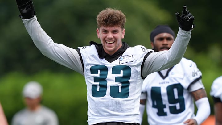 Philadelphia Eagles defensive back Cooper DeJean reacts during warmups before a practice drill at NovaCare Complex.