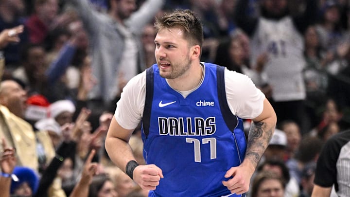 Dec 25, 2024; Dallas, Texas, USA; Dallas Mavericks guard Luka Doncic (77) celebrates after making a basket against the Minnesota Timberwolves during the first quarter at the American Airlines Center. Mandatory Credit: Jerome Miron-Imagn Images