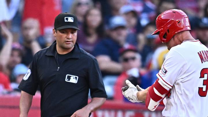 Angels first baseman Trey Mancini (34) reacts after hitting an RBI triple during the first inning against the Tampa Bay Rays at Angel Stadium on June 12, 2026.