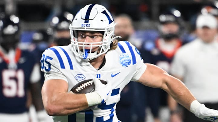 Dec 6, 2025; Charlotte, NC, USA; Duke Blue Devils tight end Jeremiah Hasley (85) runs the ball after a catch for a touchdown in the first quarter against the Virginia Cavaliers during the 2025 ACC Championship game at Bank of America Stadium. Mandatory Credit: Bob Donnan-Imagn Images Dec 6, 2025; Charlotte, NC, USA; Duke Blue Devils tight end Jeremiah Hasley (85) runs the ball after a catch for a touchdown in the first quarter against the Virginia Cavaliers during the 2025 ACC Championship game at Bank of America Stadium. Mandatory Credit: Bob Donnan-Imagn Images