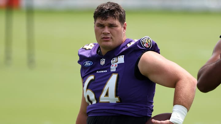 Jun 10, 2025; Baltimore, MD, USA; Baltimore Ravens center Tyler Linderbaum (64) looks on during an NFL OTA at Under Armour Performance Center. Mandatory Credit: Daniel Kucin Jr.-Imagn Images