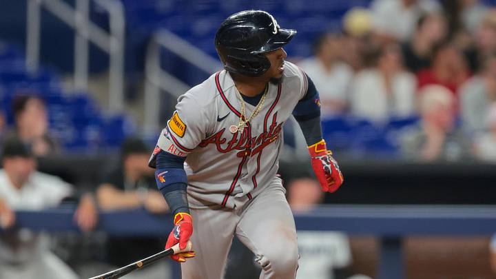 May 18, 2026; Miami, Florida, USA; Atlanta Braves second baseman Ozzie Albies (1) hits a single against the Miami Marlins during the eighth inning at loanDepot Park. Mandatory Credit: Sam Navarro-Imagn Images