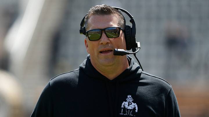 Purdue Boilermakers offensive coordinator Josh Henson looks down field. Purdue Boilermakers offensive coordinator Josh Henson looks down field.