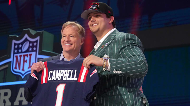 Apr 24, 2025; Green Bay, WI, USA; NFL commissioner Roger Goodell with LSU Tigers offensive lineman Will Campbell after he is selected by the New England Patriots as the number four pick in the first round of the 2025 NFL Draft at Lambeau Field. Mandatory Credit: Kirby Lee-Imagn Images