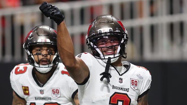 Sep 7, 2025; Atlanta, Georgia, USA; Tampa Bay Buccaneers wide receiver Emeka Egbuka (2) reacts after scoring a touchdown against the Atlanta Falcons during the second quarter at Mercedes-Benz Stadium. Mandatory Credit: Brett Davis-Imagn Images