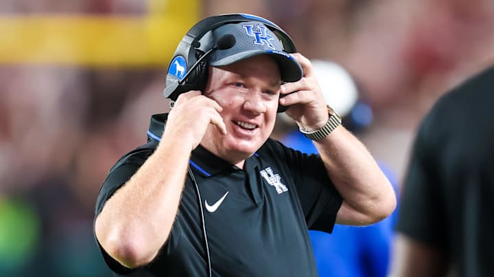 Sep 27, 2025; Columbia, South Carolina, USA; Kentucky Wildcats head coach Mark Stoops celebrates a touchdown against the South Carolina Gamecocks in the first quarter at Williams-Brice Stadium. Mandatory Credit: Jeff Blake-Imagn Images