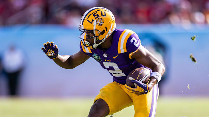 Jan 1, 2024; Tampa, FL, USA; LSU Tigers wide receiver Kyren Lacy (2) runs with the ball. Jan 1, 2024; Tampa, FL, USA; LSU Tigers wide receiver Kyren Lacy (2) runs with the ball.