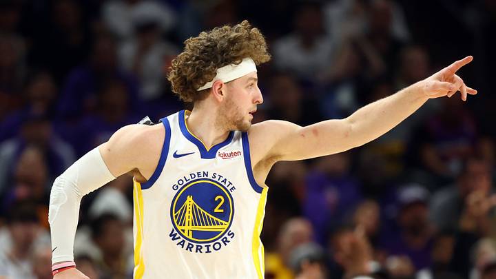 Apr 17, 2026; Phoenix, Arizona, USA; Golden State Warriors guard Brandin Podziemski (2) reacts against the Phoenix Suns during the first half in the play-in rounds of the 2026 NBA Playoffs at Mortgage Matchup Center. Mandatory Credit: Mark J. Rebilas-Imagn Images