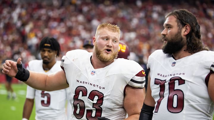 Sep 29, 2024; Glendale, Arizona, USA; Washington Commanders center Tyler Biadasz (63) with guard Sam Cosmi (76) against the Arizona Cardinals at State Farm Stadium. Sep 29, 2024; Glendale, Arizona, USA; Washington Commanders center Tyler Biadasz (63) with guard Sam Cosmi (76) against the Arizona Cardinals at State Farm Stadium.