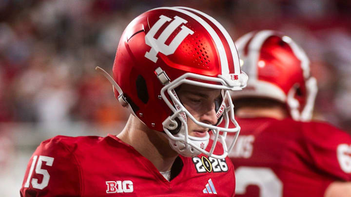 Indiana's Fernando Mendoza (15) gets loose before the College Football Playoff National Championship college football game at Hard Rock Stadium in Miami Gardens on Monday, Jan. 19, 2026. Indiana's Fernando Mendoza (15) gets loose before the College Football Playoff National Championship college football game at Hard Rock Stadium in Miami Gardens on Monday, Jan. 19, 2026.