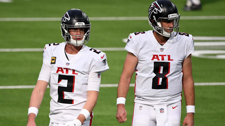 Atlanta Falcons quarterbacks Matt Ryan and Matt Schaub during pregame warmups before playing the Los Angeles Chargers.