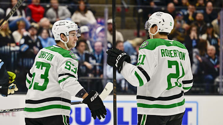 Jan 31, 2026; Salt Lake City, Utah, USA; Dallas Stars center Wyatt Johnston (53) and left wing Jason Robertson (21) celebrate after a goal during first period against the Utah Mammoth at Delta Center. Mandatory Credit: Peter Creveling-Imagn Images