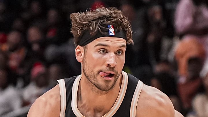 Hawks forward Corey Kispert (24) dribbles towards the basket against the Washington Wizards at State Farm Arena. 