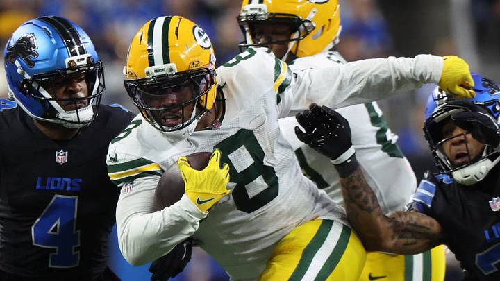 Green Bay Packers running back Josh Jacobs runs the ball during the fourth quarter against the Detroit Lions at Ford Field. Green Bay Packers running back Josh Jacobs runs the ball during the fourth quarter against the Detroit Lions at Ford Field.